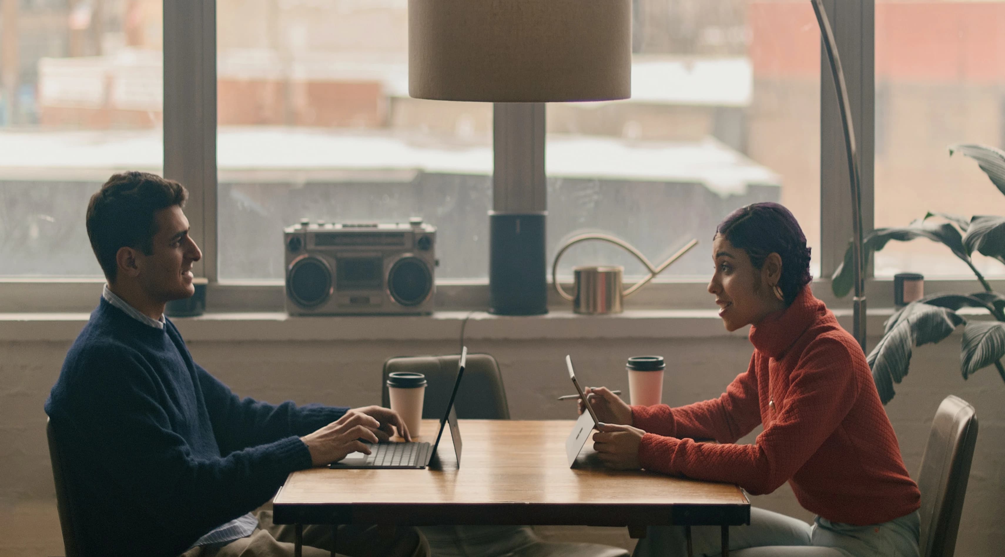 Two people co-working at a table